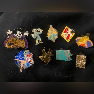 Set of 9 Assorted Disney Pins - Haunted Mansion, Sleeping Beauty